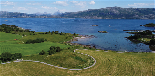 Herlaugshaugen burial mound on Leka, Norway, beside the coastal landscape